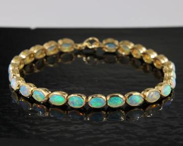 Armband aus 750er Gelbgold mit blaugrünen australischen Kristallopalen